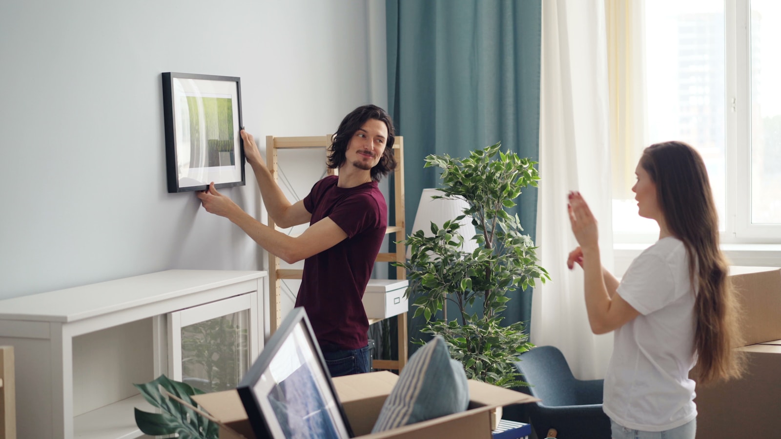 A couple settling into their new East Bay home after a move